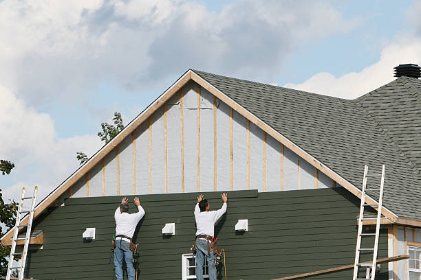 Professional Emergency Siding Repair technician working in Manasquan, NJ